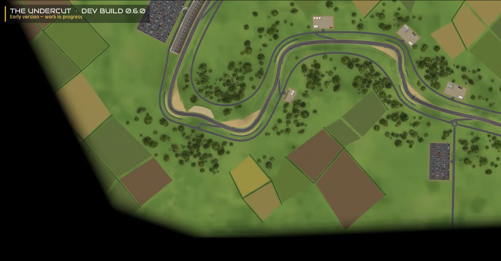The Undercut 0.6.0 dev build — a wide view of a procedurally generated circuit: the track winds through woods and patchwork farm fields, with car parks, a grandstand, service roads and trackside buildings