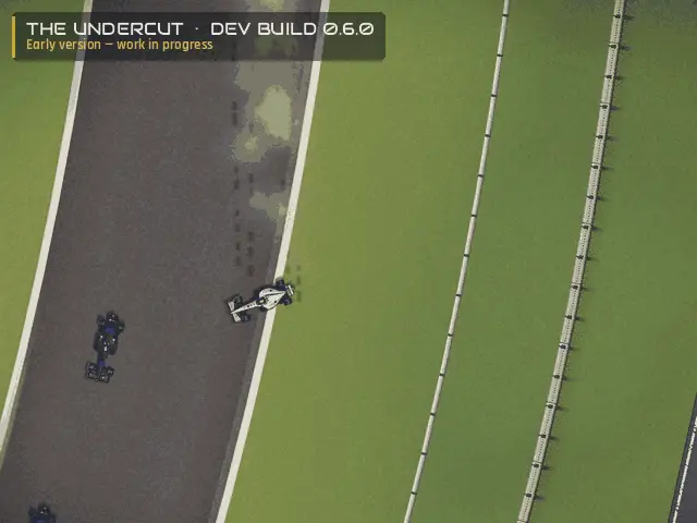 The Undercut 0.6.0 dev build — a car loses it, slides across the run-off and slams into the tyre wall in a cloud of dust