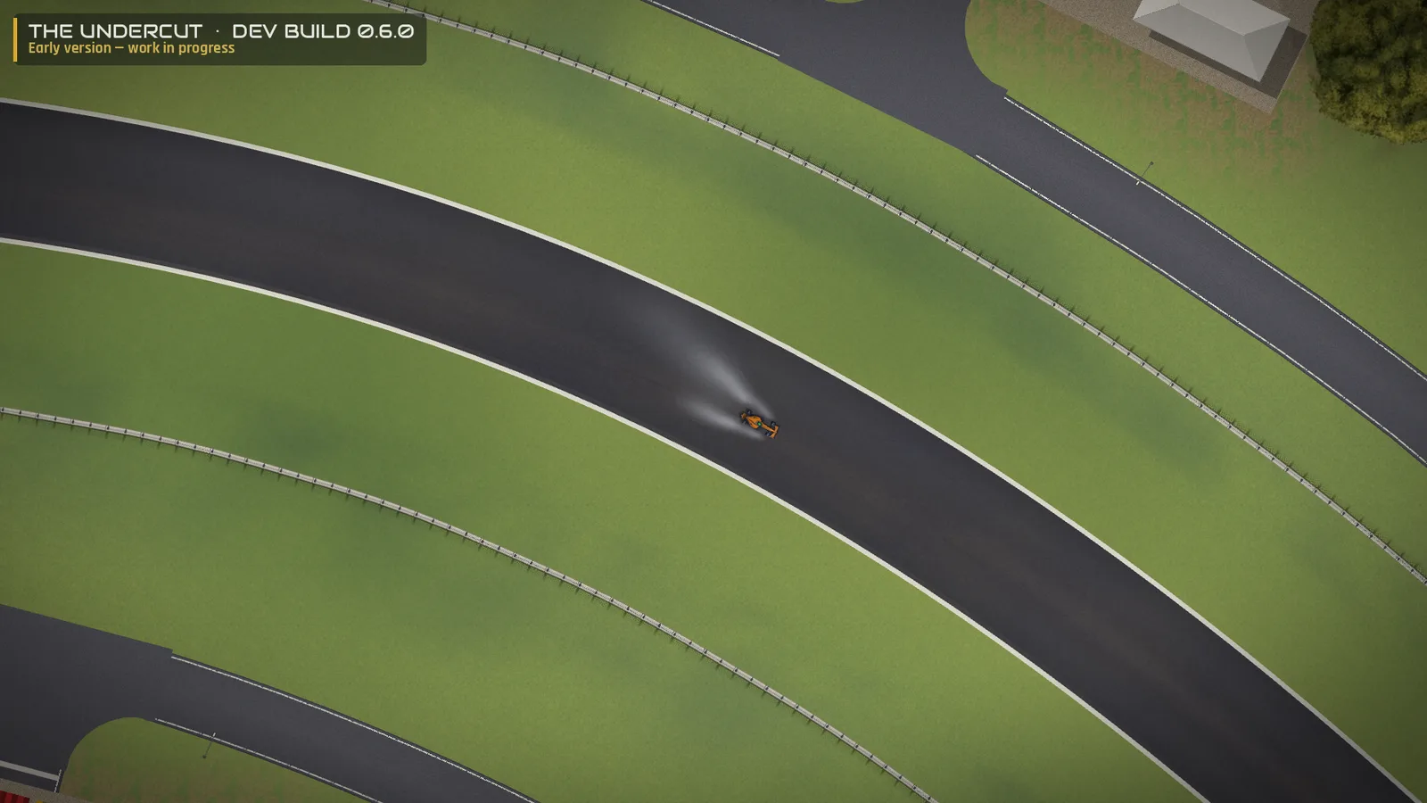 The Undercut 0.6.0 dev build — a drying track: a darker dry line has formed through the corner while the rest of the surface is still wet